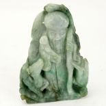 Chinese Carved Jade Shou Lao Figurine. Depicted holding staff and scepter. Light to dark green in