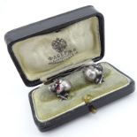 Antique Faberge 84 Silver and Enamel Figural Skull Cufflinks with Ruby Eyes and with Faberge