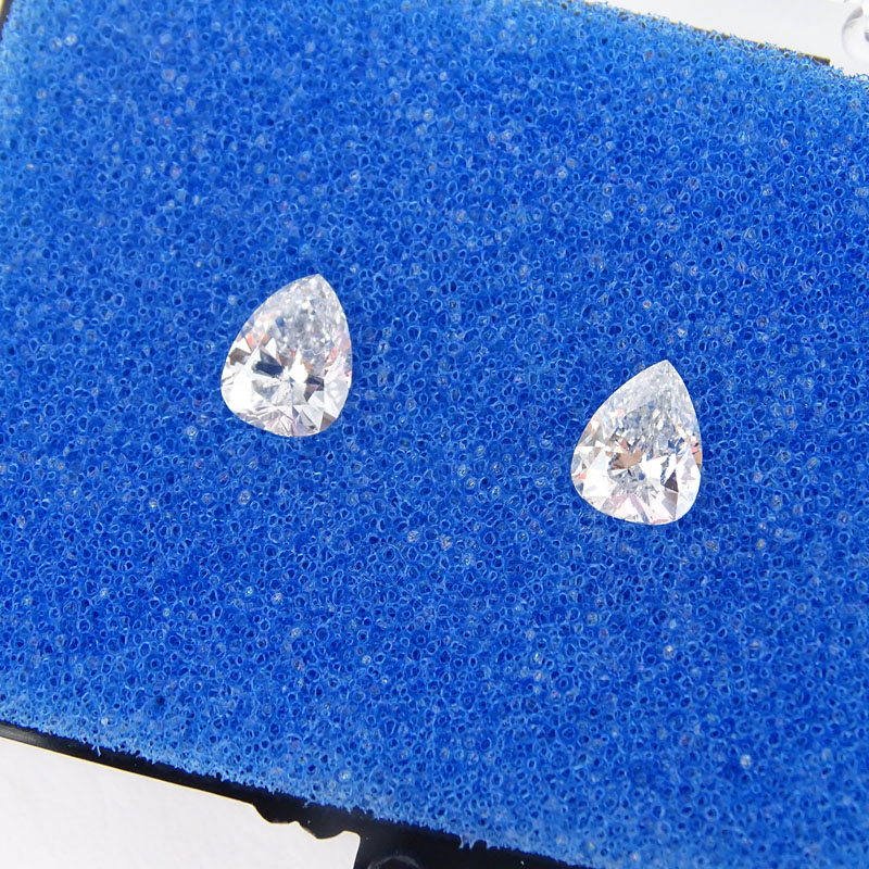 Two (2) GIA Certified Antique Pear Shape Diamonds. 1.01 Carat, F color, I1 clarity; 1.12 carat, E