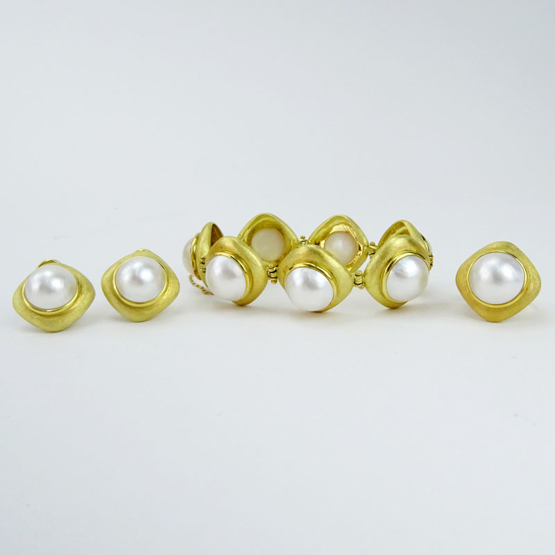 Vintage Rajola 18 Karat Yellow Gold and Mabe Pearl Bracelet, Ring and Earrings Suite. All signed and