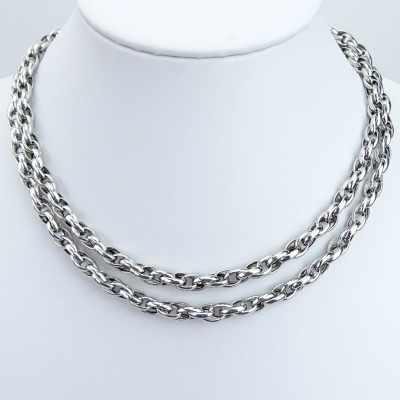 Vintage Italian Platinum and 18 Karat Yellow Gold Braided Style Necklace. Signed, stamped PLAT.