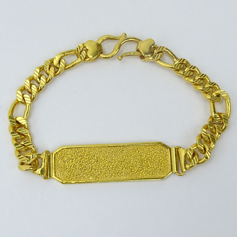 Vintage 24 Karat Fine Yellow Gold I.D. Bracelet. Stamped 9999, good condition. Measures 7-1/2" Long,