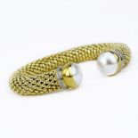 Italian 14 Karat Yellow Gold Flexible Cuff Bangle with Mabe Pearl and Diamond Accents. Stamped
