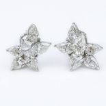 Vintage Harry Winston style Approx.14.0 Carat Pear Shape Diamond and Platinum Earrings. Each diamond