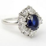 Cartier Diamond, Sapphire and Platinum Ballerina Ring. The diamonds of superb quality, the