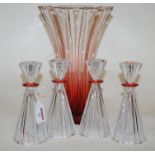 A mid 20th century ruby tinted glass vase of inverted tapering form together with a set of four