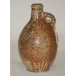 A 19th century stoneware bellamine of typical form,