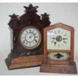 A late 19th century German stained pine cased mantel clock having an enamel dial with Roman