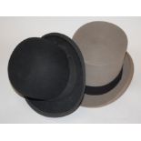 An early 20th century grey velvet top hat bearing a label for Moss Bros, Covent Garden,