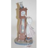 A Lladro figure of a girl beside a grandmother clock, printed mark verso, and impressed 5347,