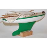 A mid 20th century painted wooden pond yacht