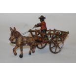 A reproduction cast iron figure of a horse drawn cart