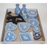 A collection of Wedgwood blue jasper wares to include trinket jars, vases,