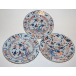 A set of three 19th century Chinese export tin glazed plates in the Imari palette