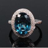 A contemporary 14ct white gold, topaz and diamond ring,