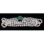 A triple string cultured pearl choker,