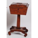 A Regency rosewood pedestal teapoy, having well-fitted four caddy interior,