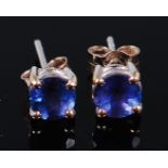 A pair of 18ct white gold and tanzanite ear studs,