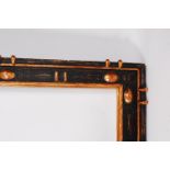 A contemporary French giltwood and black painted picture frame, of good size,