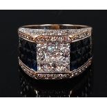 A contemporary white metal, sapphire and diamond ring,