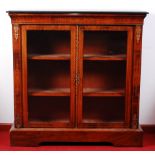 A Victorian figured walnut and inlaid pier cabinet,
