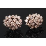 A pair of white gold and diamond cluster ear studs,