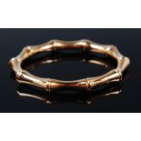 A ladies 18ct gold Gucci faux bamboo sprung bracelet, boxed and with further outer box and papers,