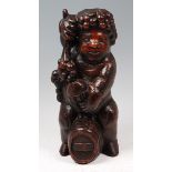 A 19th century carved oak figure of Bacchus,