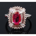A contemporary 14ct white gold, ruby and diamond ring,
