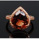 A contemporary 14ct gold and champagne topaz set ring,