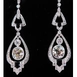 A pair of Art Deco 18ct white gold and diamond set ear pendants, each having double pendant drop,