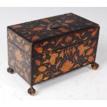 A Regency black lacquered and gilt decorated tea caddy,