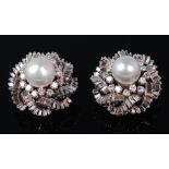 A pair of cultured pearl and diamond earrings by Graff, each 12mm and 12.
