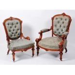 A pair of Victorian walnut and inlaid ladies and gentlemans salon chairs,