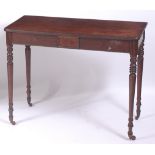 A Regency mahogany side table, having a plain frieze with reeded ends,