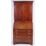A George III mahogany bureau cabinet,