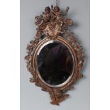 A late 19th century Italian bronze wall mirror,