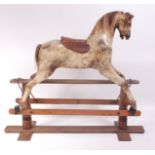 A late Victorian childs dapple-grey rocking horse by G&J Lines Ltd, having mane,