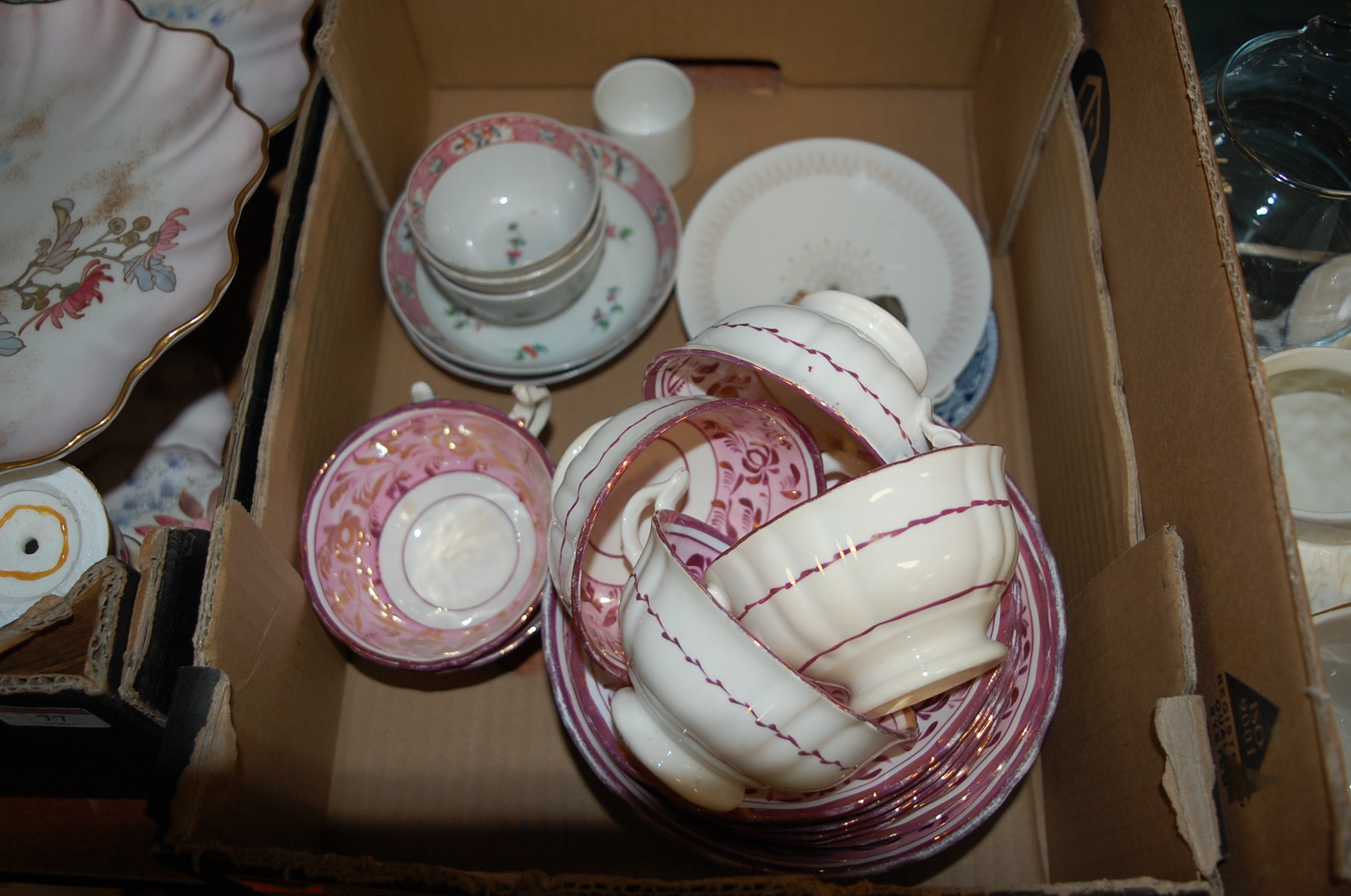 A pair of early 19th century Newhall tea bowls and saucers,
