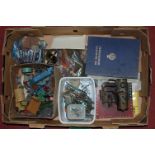 A box of various playworn diecast toys to include Dinky etc together with various cigarette cards