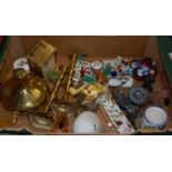A box of miscellaneous items to include pair of turned brass candlesticks, modern carriage clock,