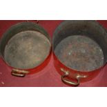 A large early 20th century hammered copper pan having twin brass handles, stamped L Jaeggi & Co,