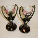A pair of early 20th century French green glazed twin handled vases, h.