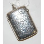A silver and engraved vesta case