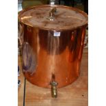 A large early 20th century copper twin handled urn and cover having a brass tap,