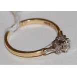 An 18ct gold diamond solitaire ring, the claw set brilliant weighing approx 0.