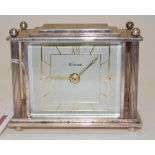 A Davall silver plated cased Art Deco mantel clock having signed silvered dial