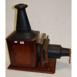 A circa 1900 mahogany cased Magic Lantern;