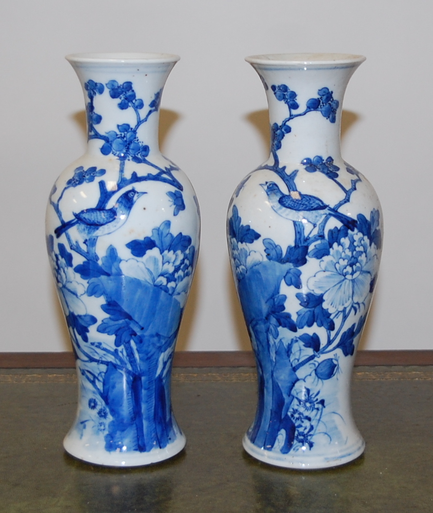 A pair of Chinese export stoneware blue and white vases of baluster form,