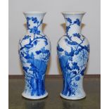 A pair of Chinese export stoneware blue and white vases of baluster form,